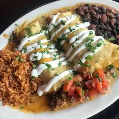 El Mundo signature dishes Burrito GrandeThe Dippity DoChile Relleno